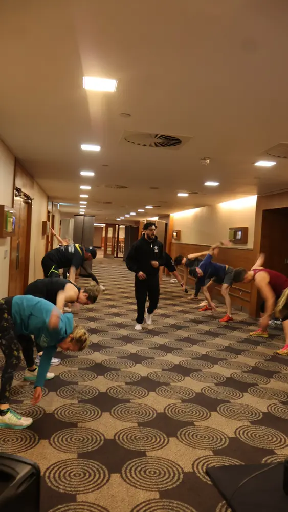 Sidhu Fitness private event participants performing dynamic movement drills with Tony coaching